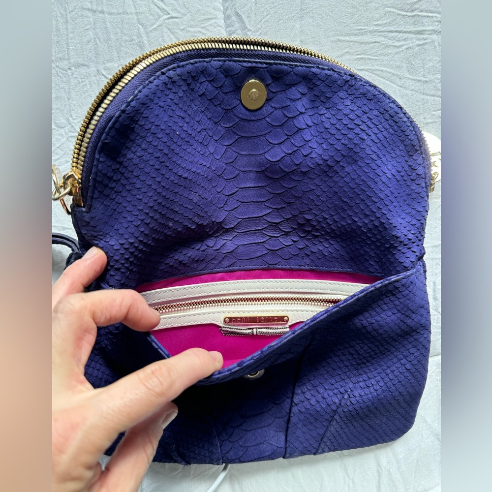 Henri Bendel clutch. Purple croc. Satin lining. Comes with duster.